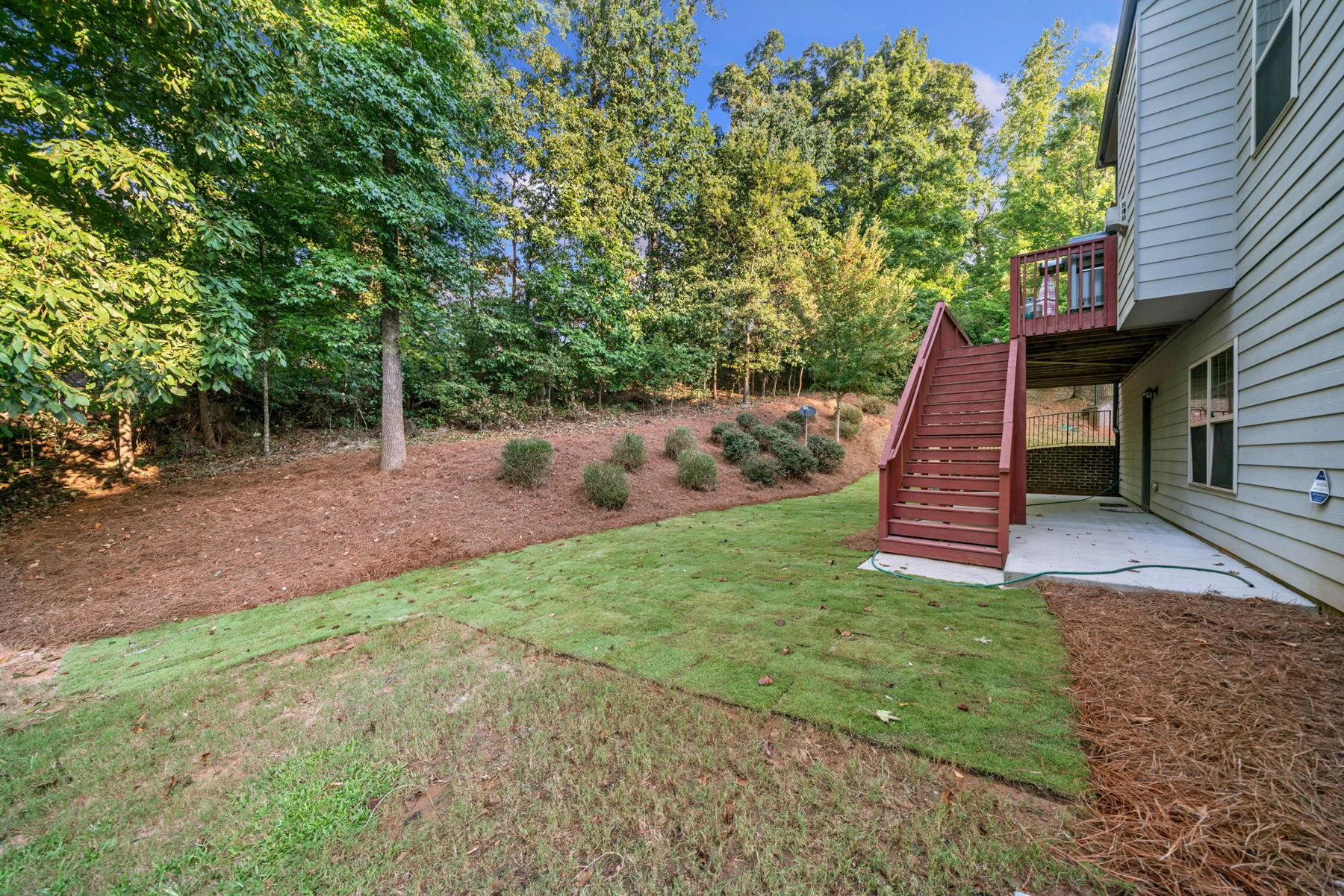 Rear exterior & lawn at 5265 Winflow Way