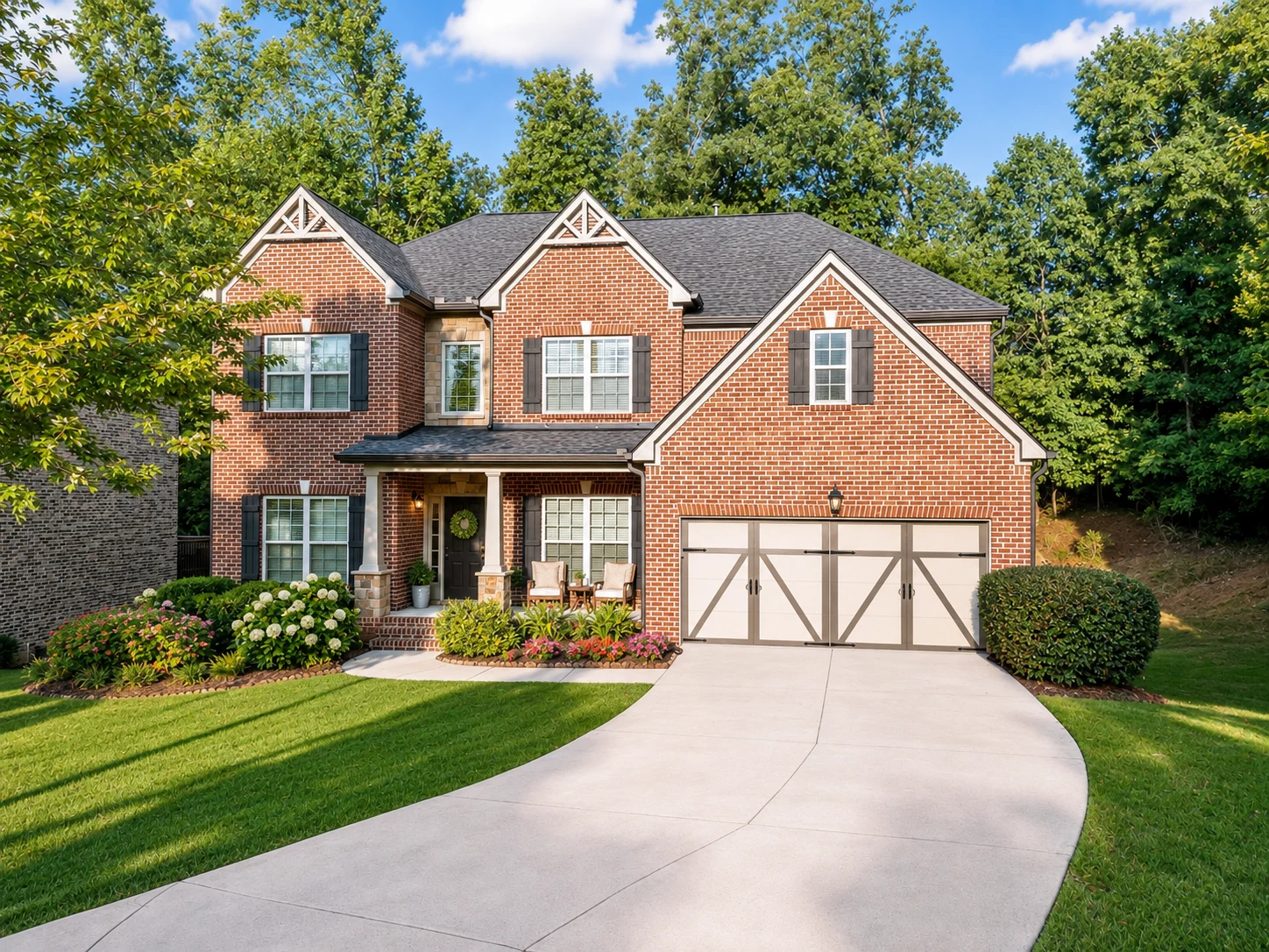 Brick front exterior, covered entry and driveway at 5265 Winflow Way